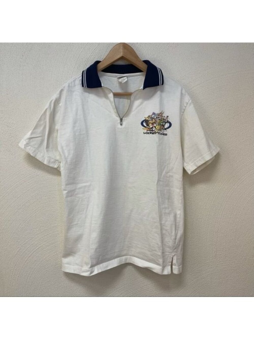 Looney Tunes White Half-Zip Polo Shirt With Embroidered Graphic & Navy Collar Si